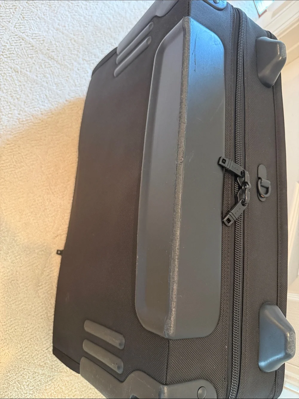 Tumi Black Fold-Open Garment Bag with Multiple Zip Pockets